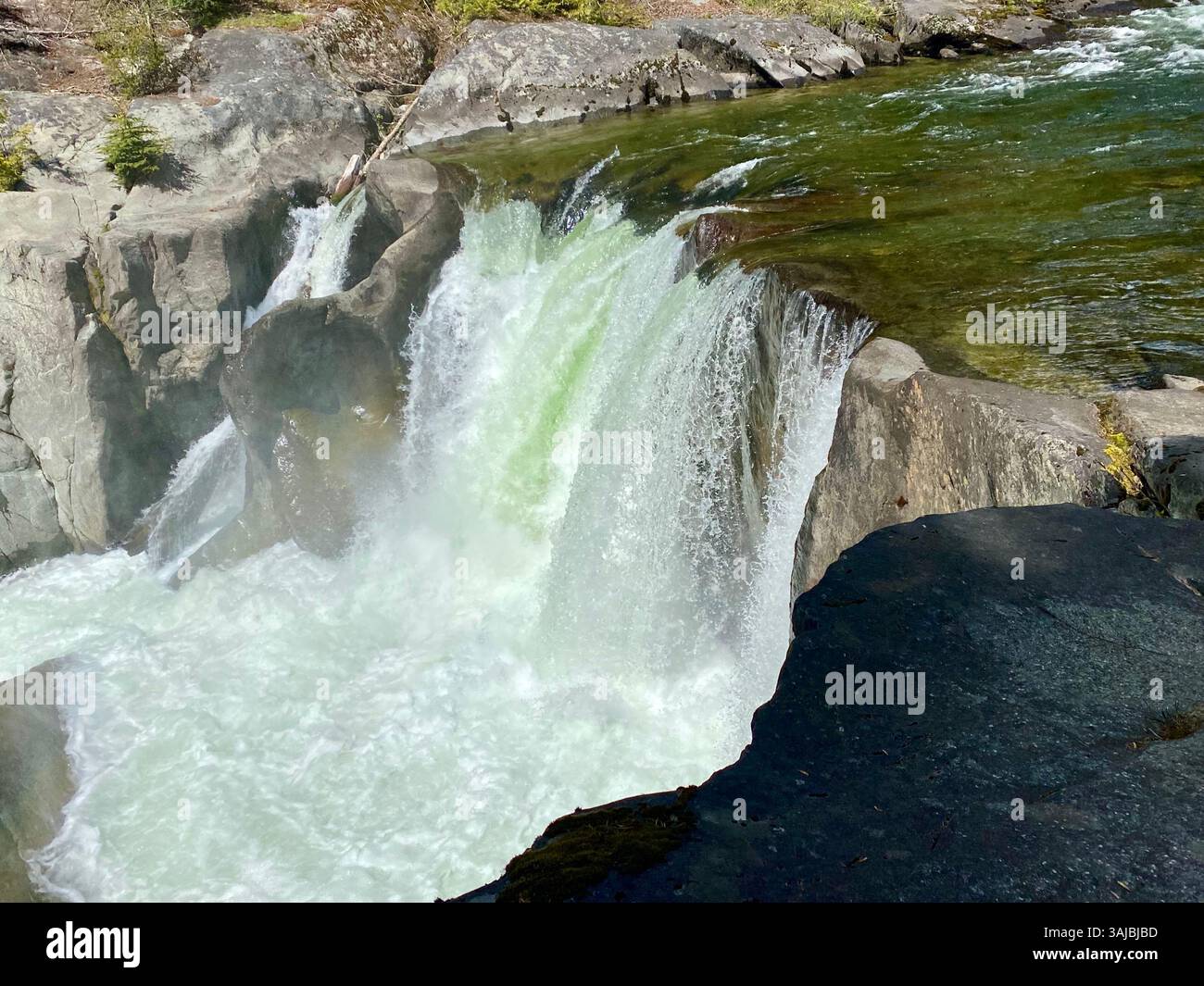 Powerful Waterfall Flowing Through Rocky Gorge - Smartphone Captured Stock Image