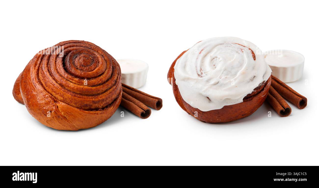 Tasty cinnamon rolls with cream and sticks isolated on white Stock ...