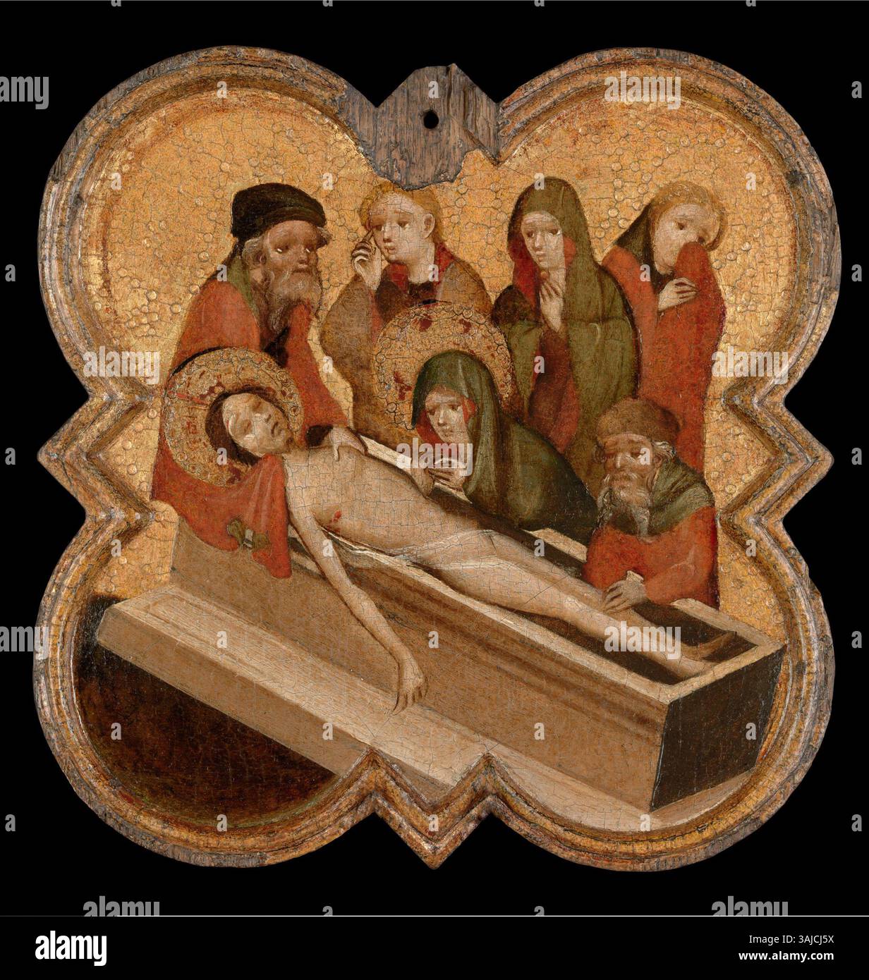 This circa 1400 oil painting depicts the Entombment of Christ