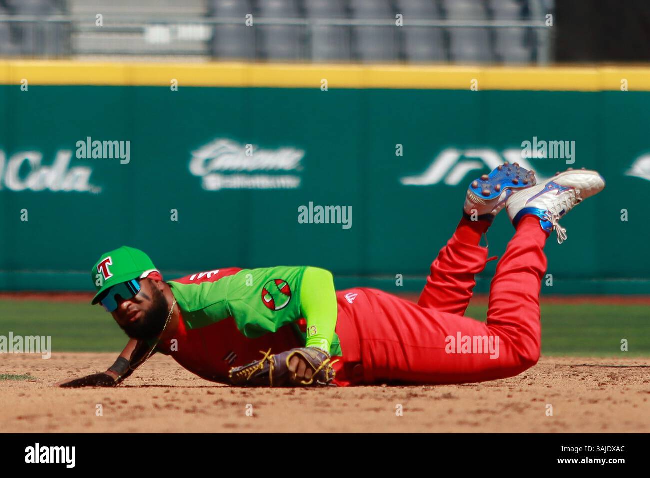 Rafael Viñales #34 of Leñadores de Las Tunas on the ground after ...