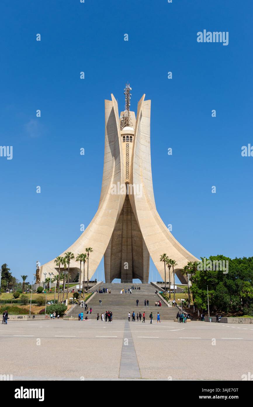 A Group Of People In Maqam Echahid Monument Square In Algiers City a-group-of-people-in-maqam-echahid-monument-square-in-algiers-city