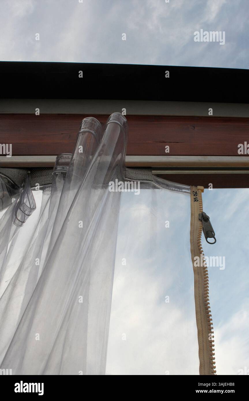 curtain, door to heaven, plastic, zipper, window, plastic protector, enclosed sky, heaven, closed, opening, open, plastic curtain with zipper, exit, e Stock Photo