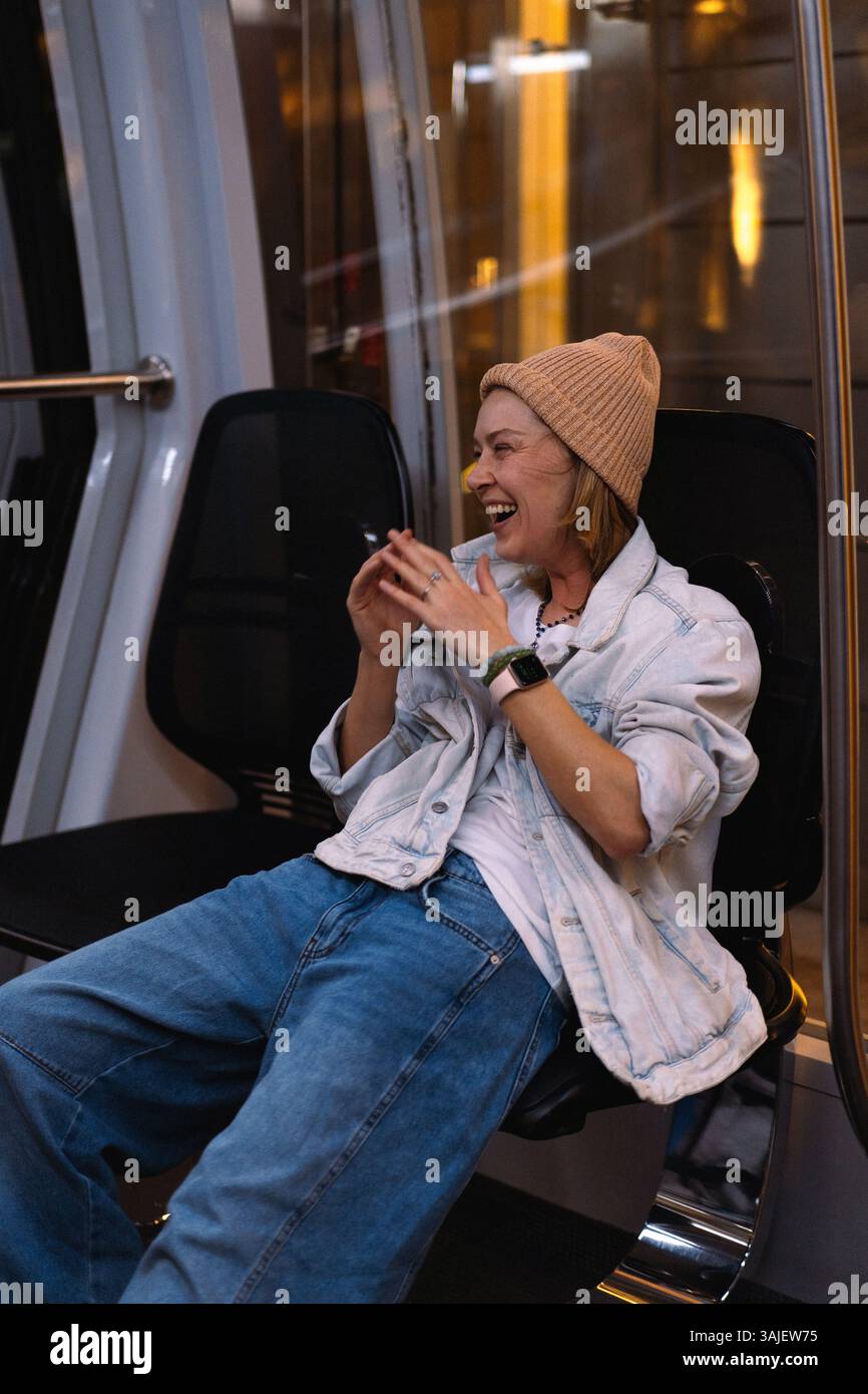 Woman on the subway train hi-res stock photography and images - Alamy