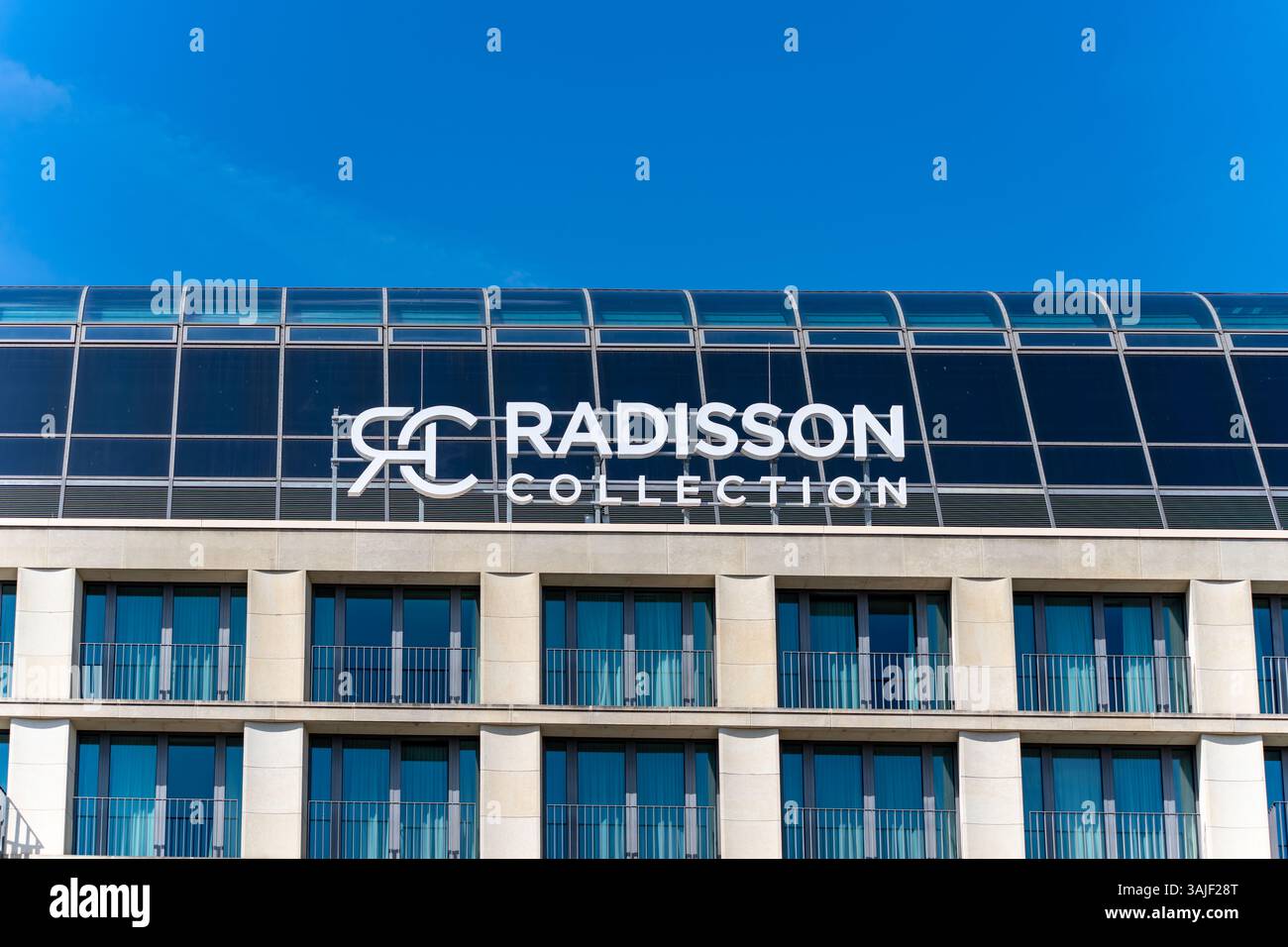 Germany Berlin April 10, 2025. A building with a large sign that says ...