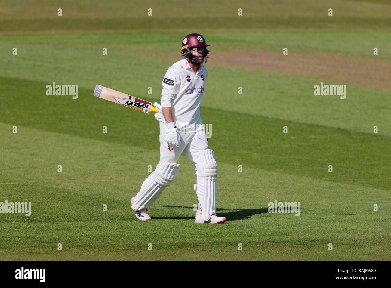 Northamptonshire's Luke Procter leaves the field after being bowled out ...