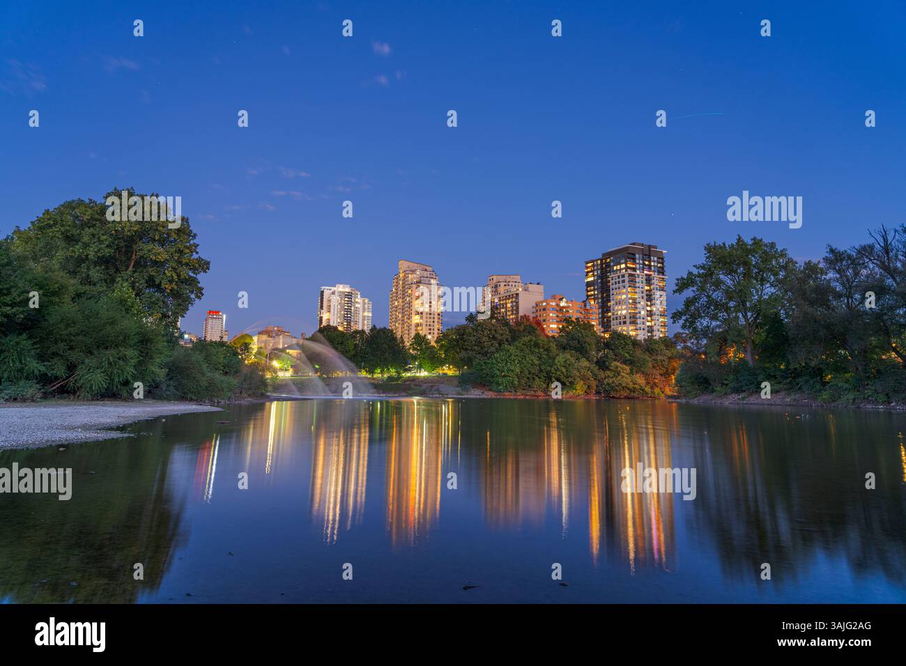 London, Ontario, Canada Skyline at blue hour on the Thames River. Stock Photo