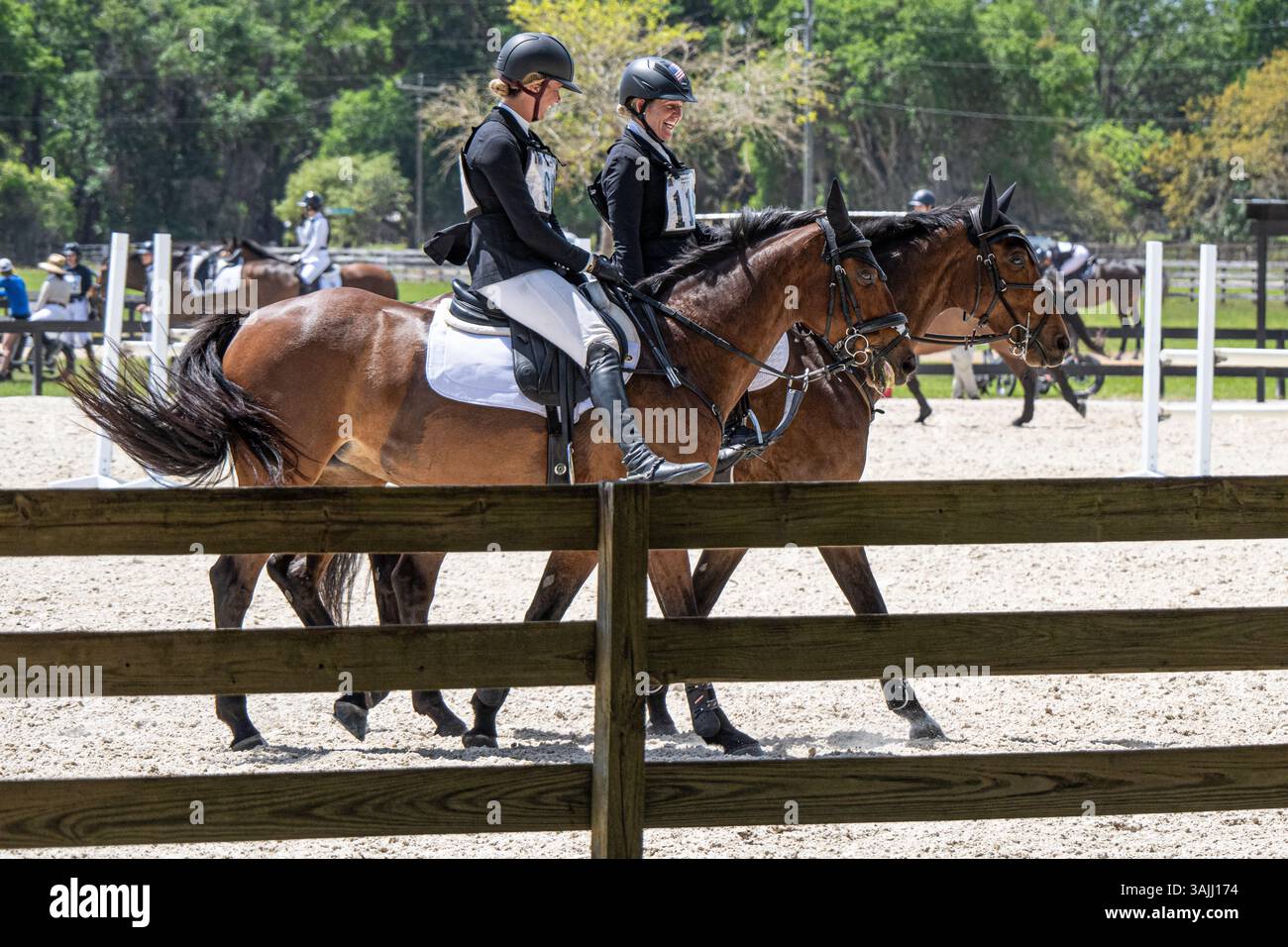 Caroline Pamukcu (R) and Sharon White (L) at the Rocking Horse Spring Horse Trials at Rocking Horse Stables in Alatoona, Florida. (USA) Stock Photo