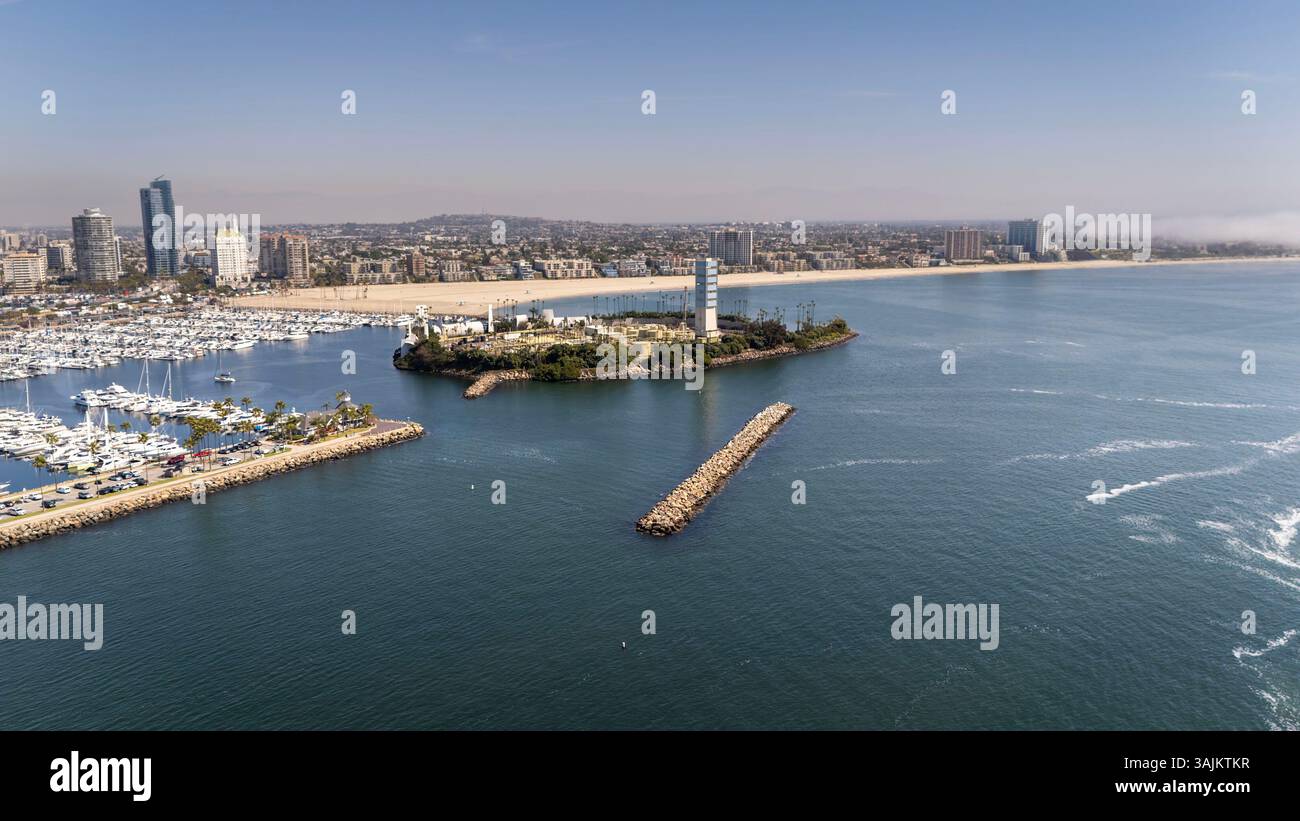 An aerial view of Long Beach reveals a vibrant coastal city with a busy ...
