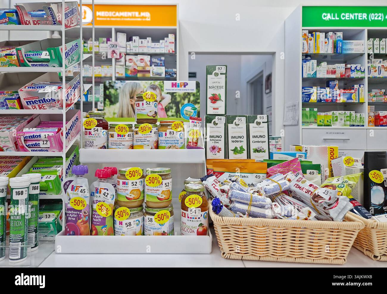 UNGHENI, MOLDOVA - June 06, 2024 Pharmacy stocked shelves with baby food, healthcare products and medications on sale - Smartphone Captured Stock Image