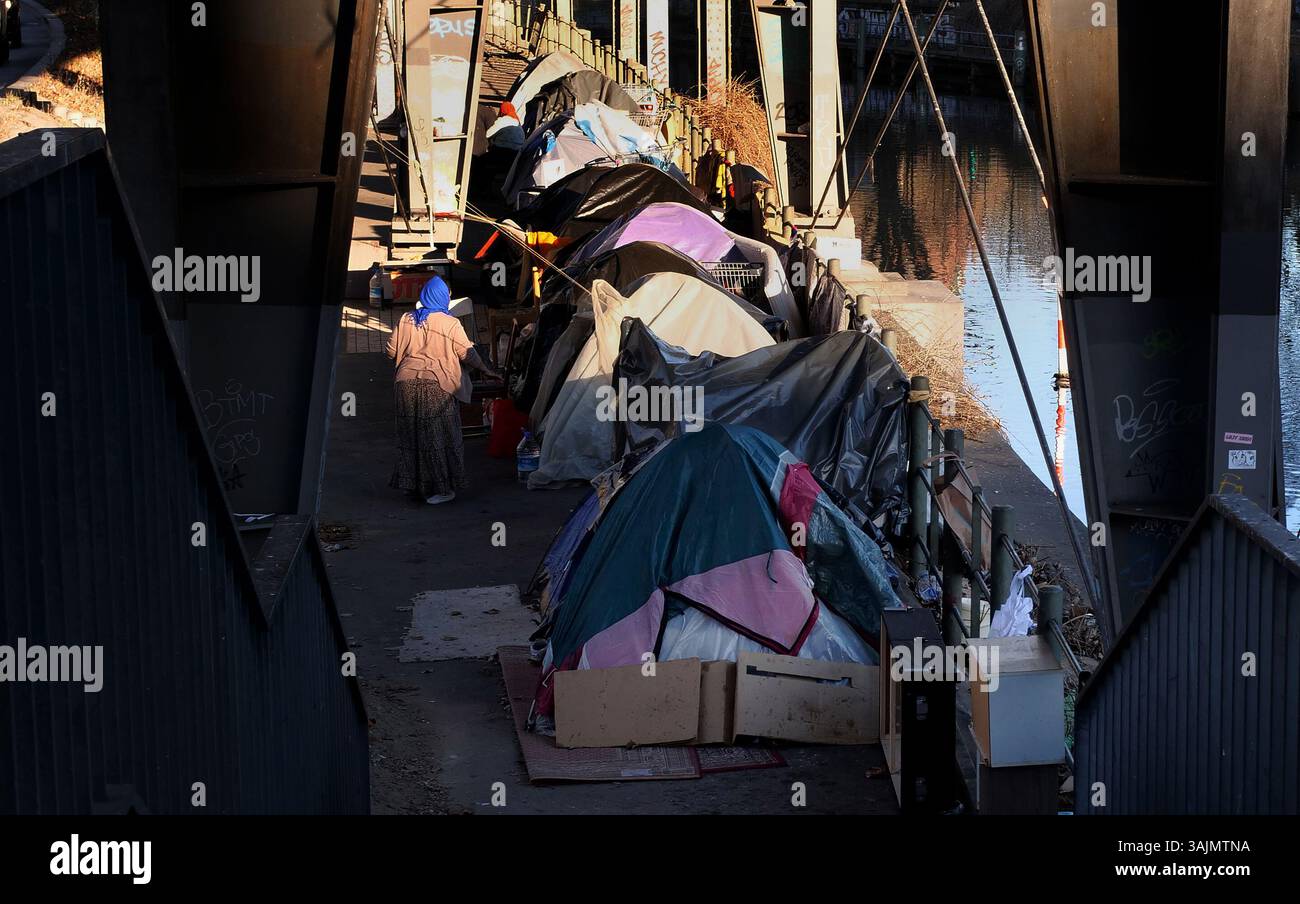 Berlin, Germany. 18th Mar, 2025. 18.03.2025, Berlin. A homeless woman ...