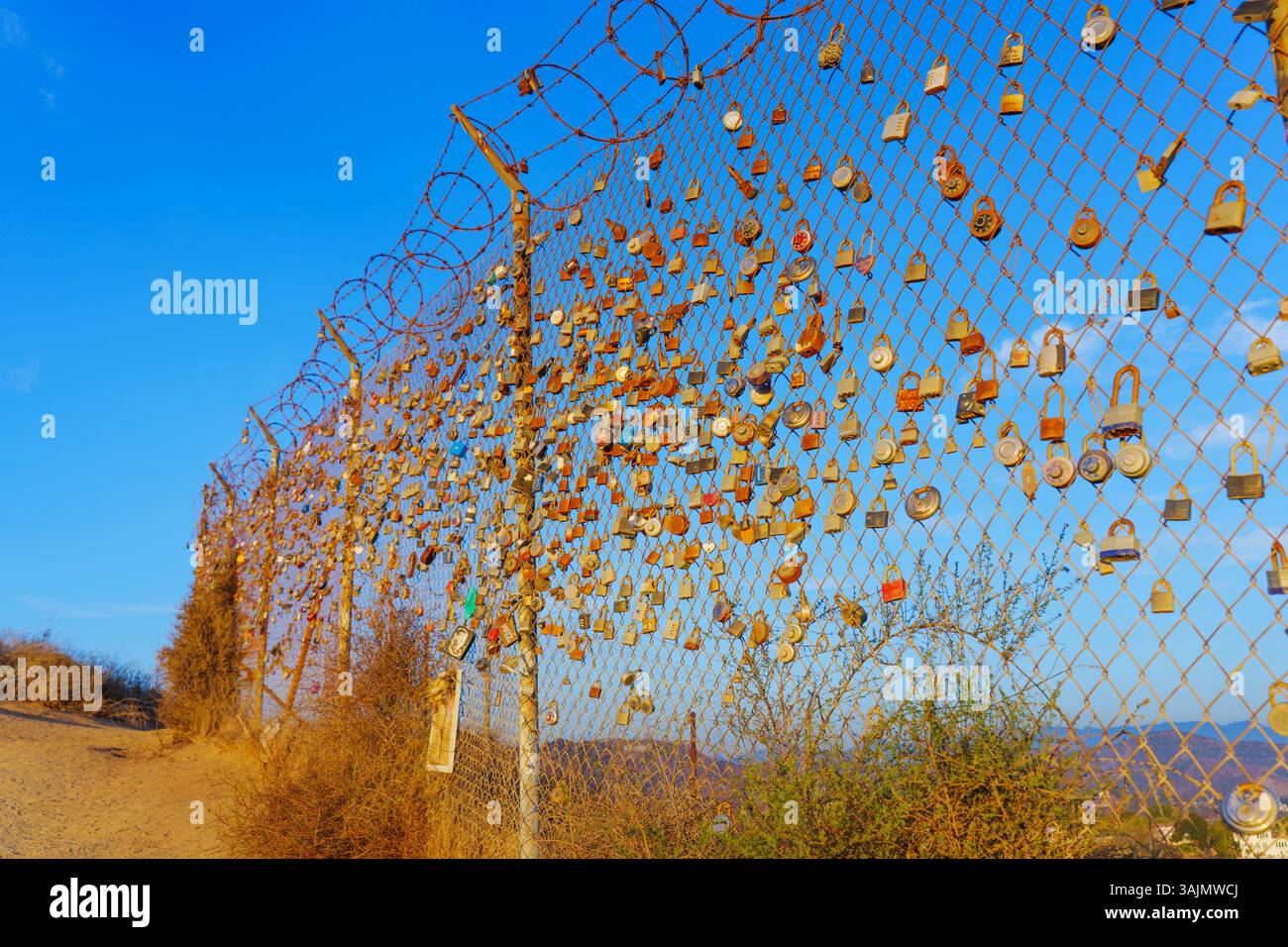Locks on chain link hi-res stock photography and images - Alamy