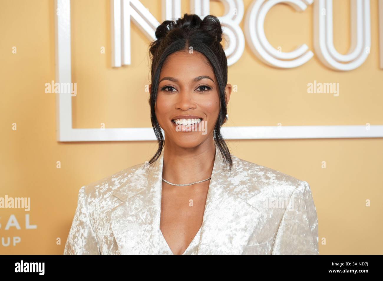 Lex Scott Davis arrives at the NBCU Emmy luncheon on Friday, April 11 ...