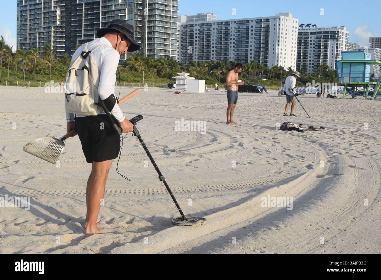 Man with metal detector at Miami Beach, Miami, Florida, USA Stock Photo ...