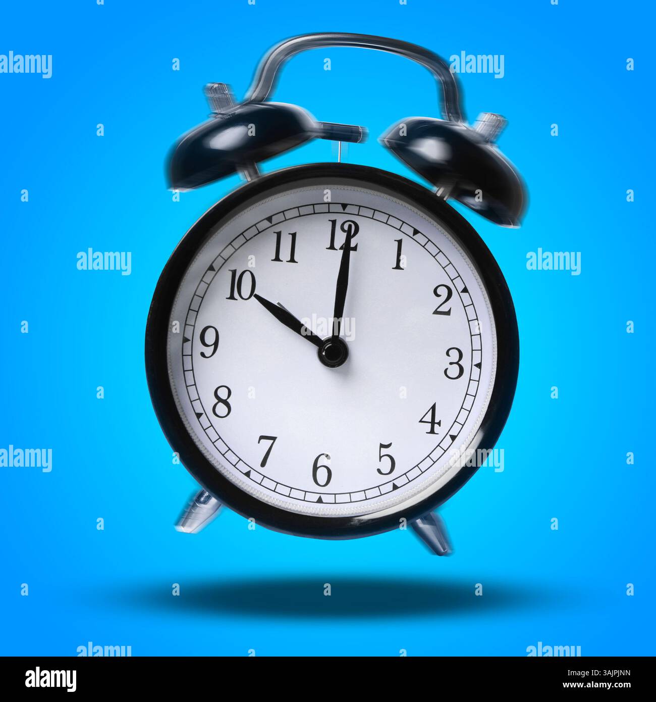 Black alarm clock ringing and jumping on blue background Stock Photo ...