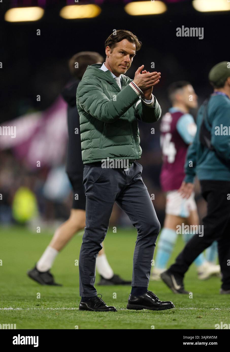 Burnley manager Scott Parker applauds the fans after the Sky Bet ...