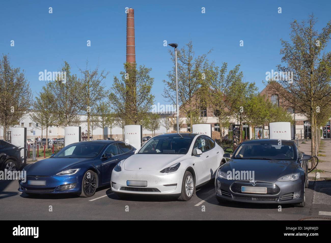 Tesla charging station for electric cars in Cologne Mülheim Stock Photo