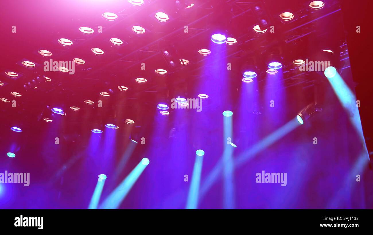 musical concert stage light, spotlights working during the concert with Stage fog Stock Photo