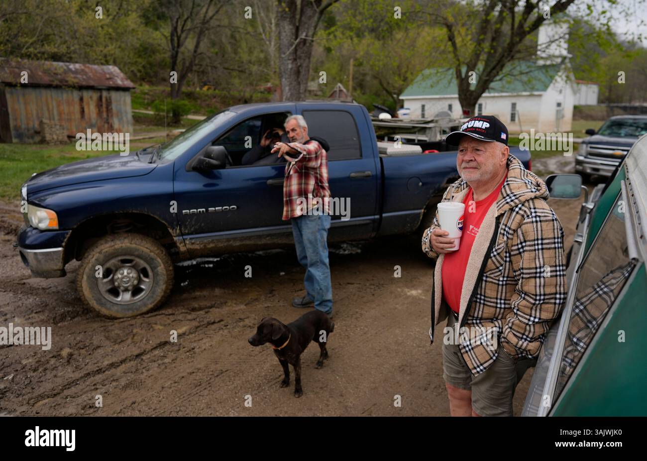 Al Geiger, right, Greg Fitzgerald, left in the truck, and Donald Davis ...