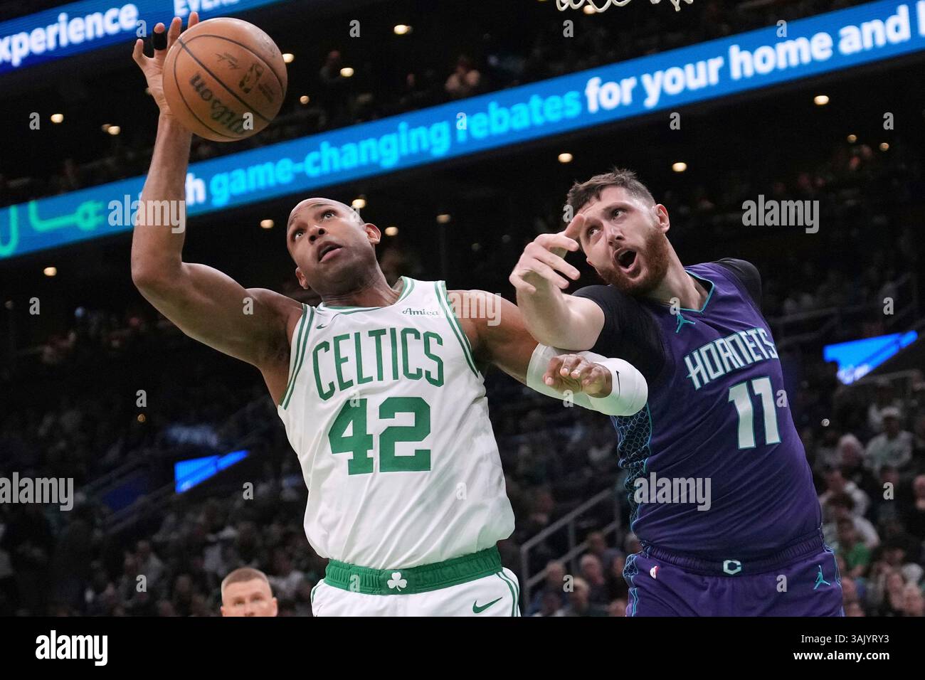 Boston Celtics center Al Horford (42) battles for a rebound against