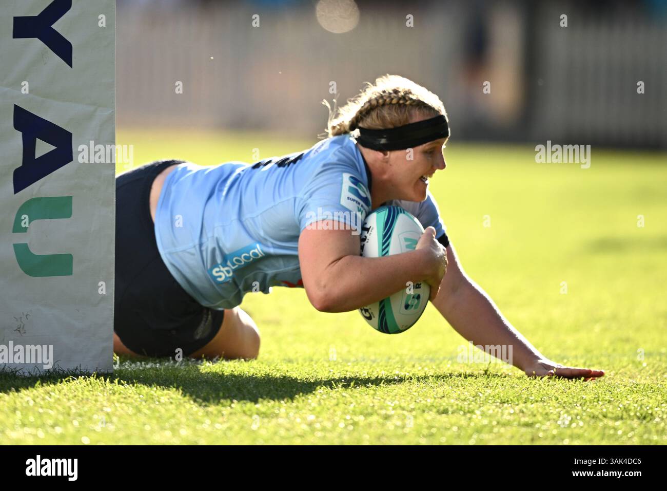 Emily Robinson of the Waratahs scores a try during the Super Rugby ...