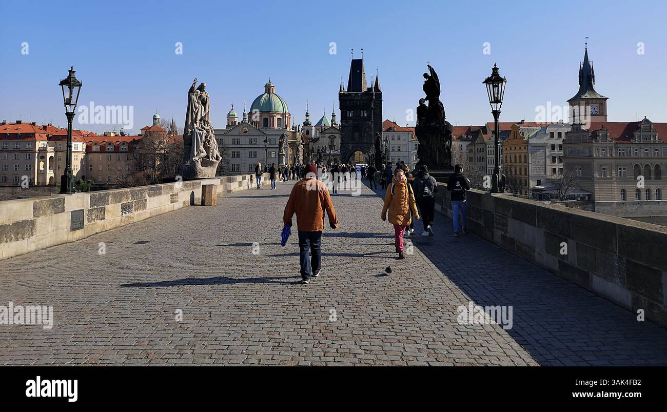 The beautiful Charles Bridge in Prague in the Czech Republic captured during a rare quiet period when Russia had just invaded Ukraine in 2022. - Smartphone Captured Stock Image