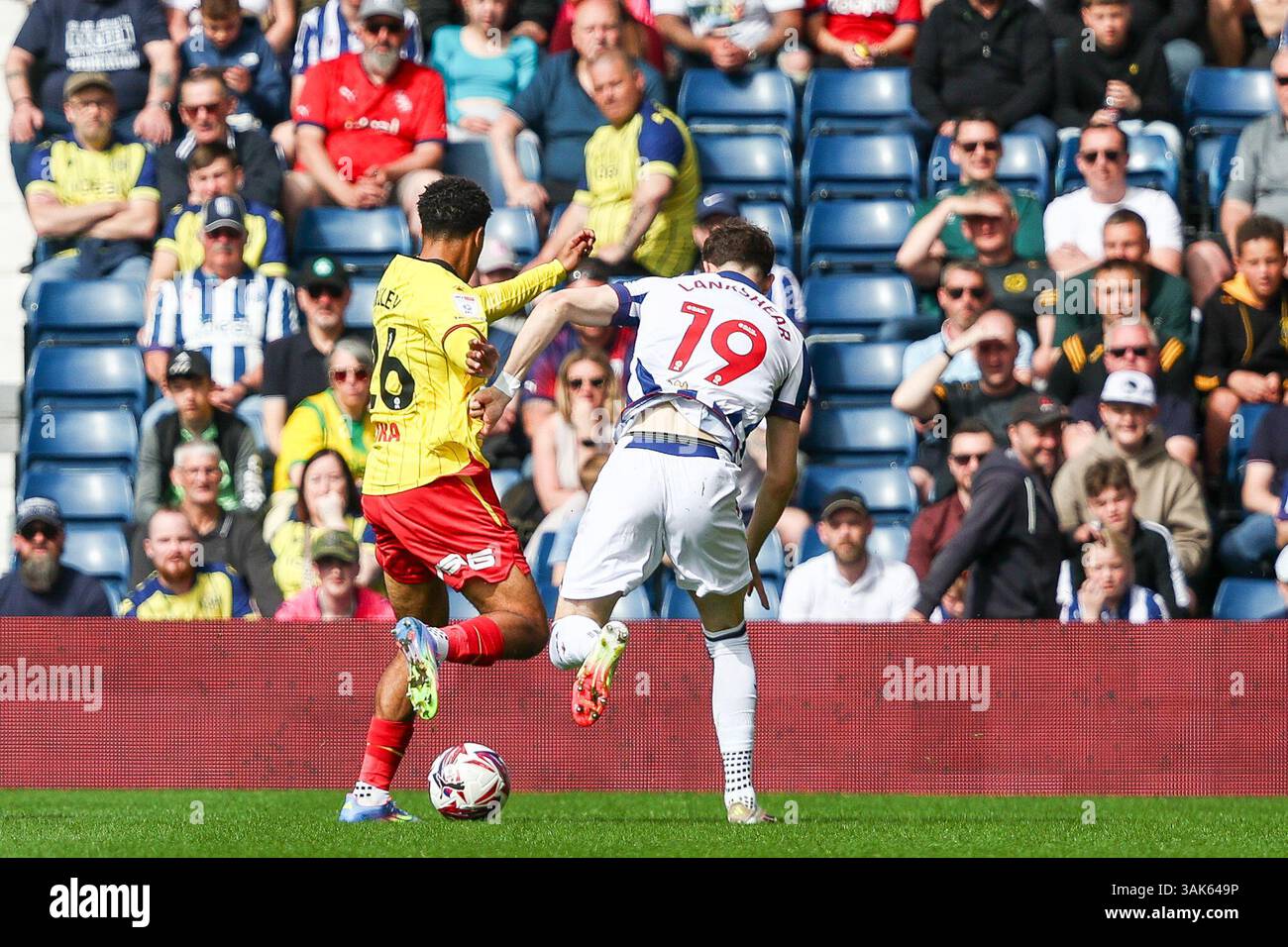 26-caleb-wiley-of-watford-19-will-lankshear-of-wba-battle-for