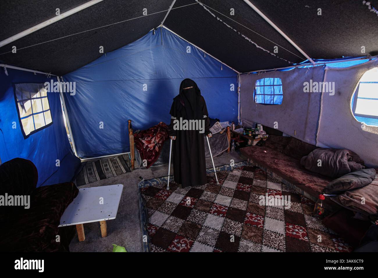 Marwa Riyad al-Basyouni, a 33-year-old displaced Palestinian, lives ...