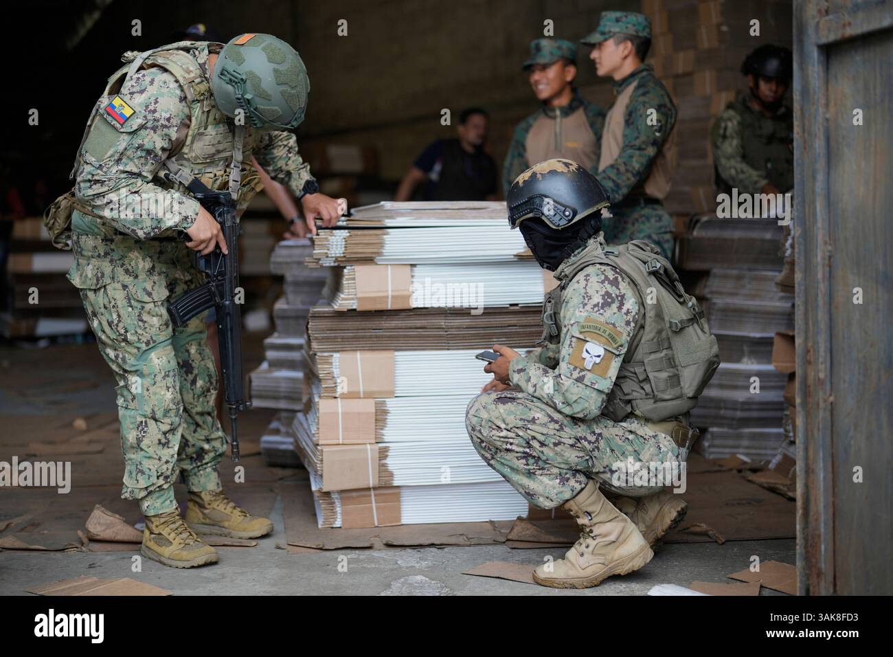Navy soldiers count election materials to be taken to a polling station ...