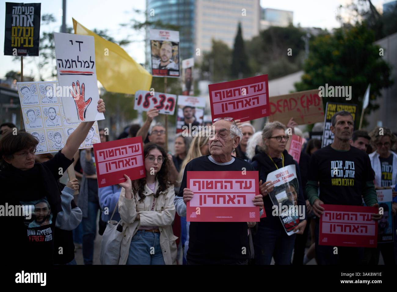 People gather in a protest demanding the immediate release of hostages ...