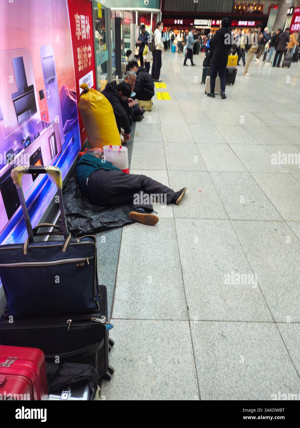Migrant workers beijing railway station hi-res stock photography