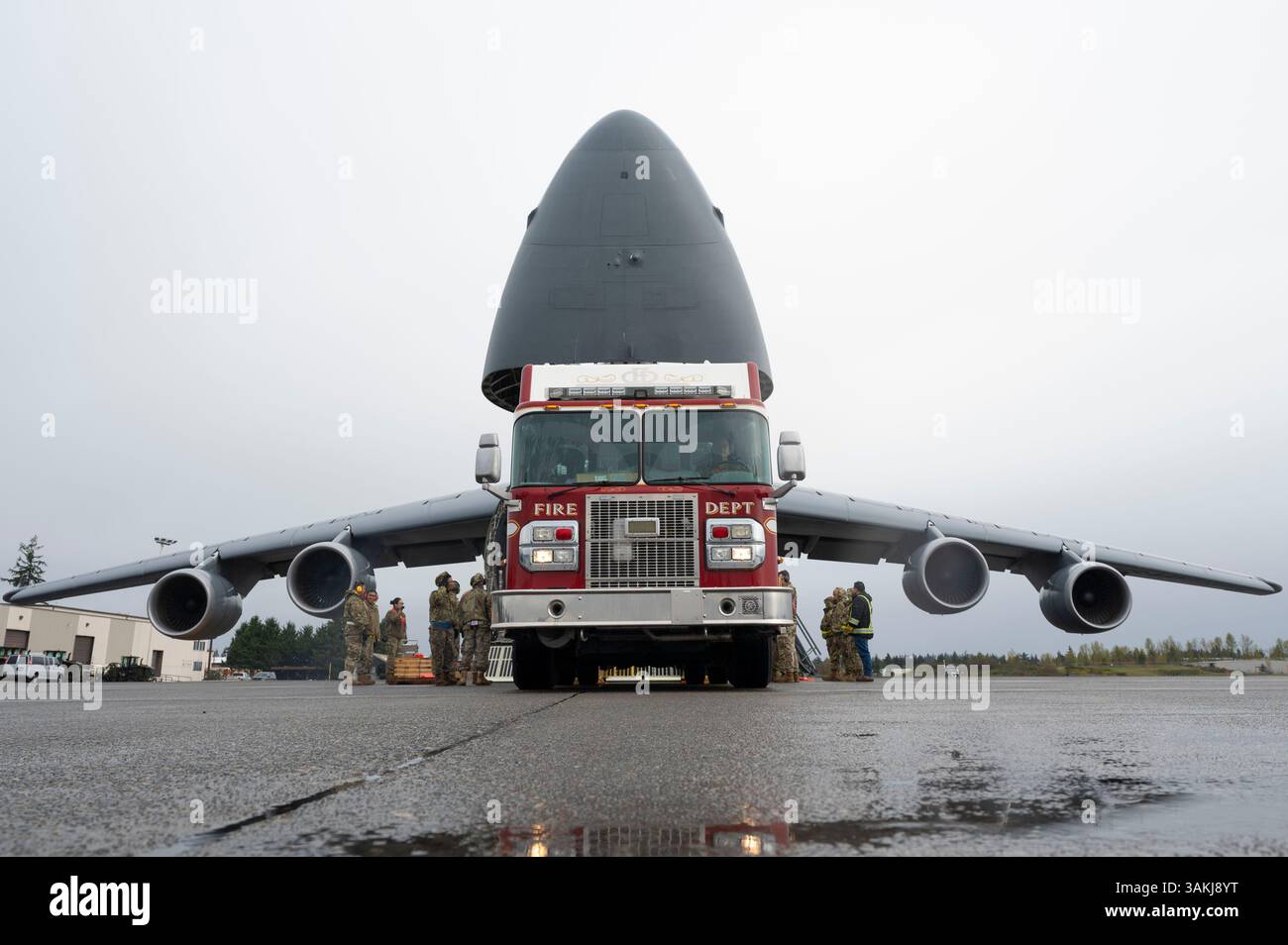 U.S. Air Force Airmen with the 62d Aerial Port Squadron, 446th APS and ...