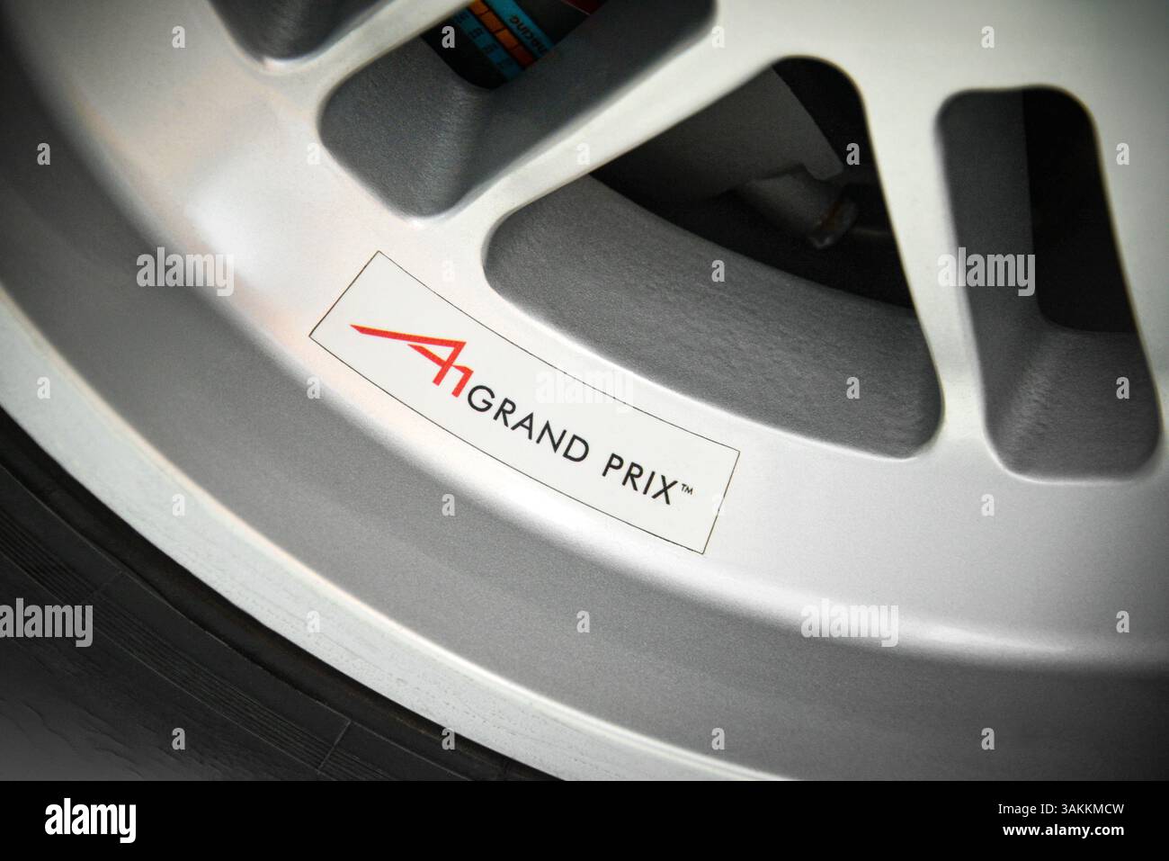 Wheel of a A1 Grand Prix racecar at a car museum Stock Photo - Alamy