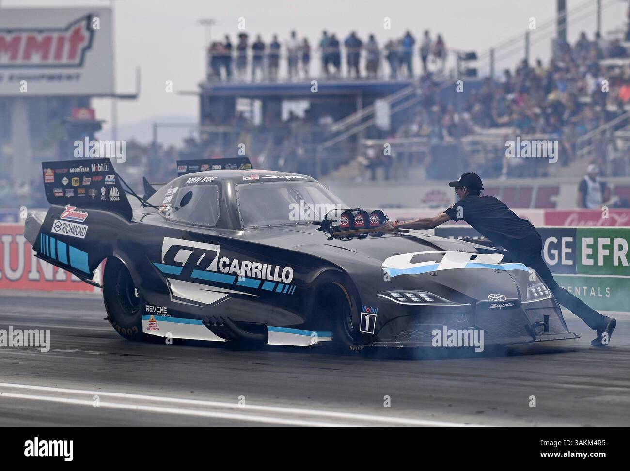 LAS VEGAS, NV - APRIL 12: Funny Car driver Bobby Bode backs up his hot ...