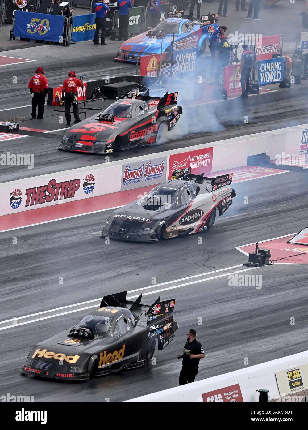LAS VEGAS, NV - APRIL 12: Funny Car drivers, from bottom, Spencer Hyde ...