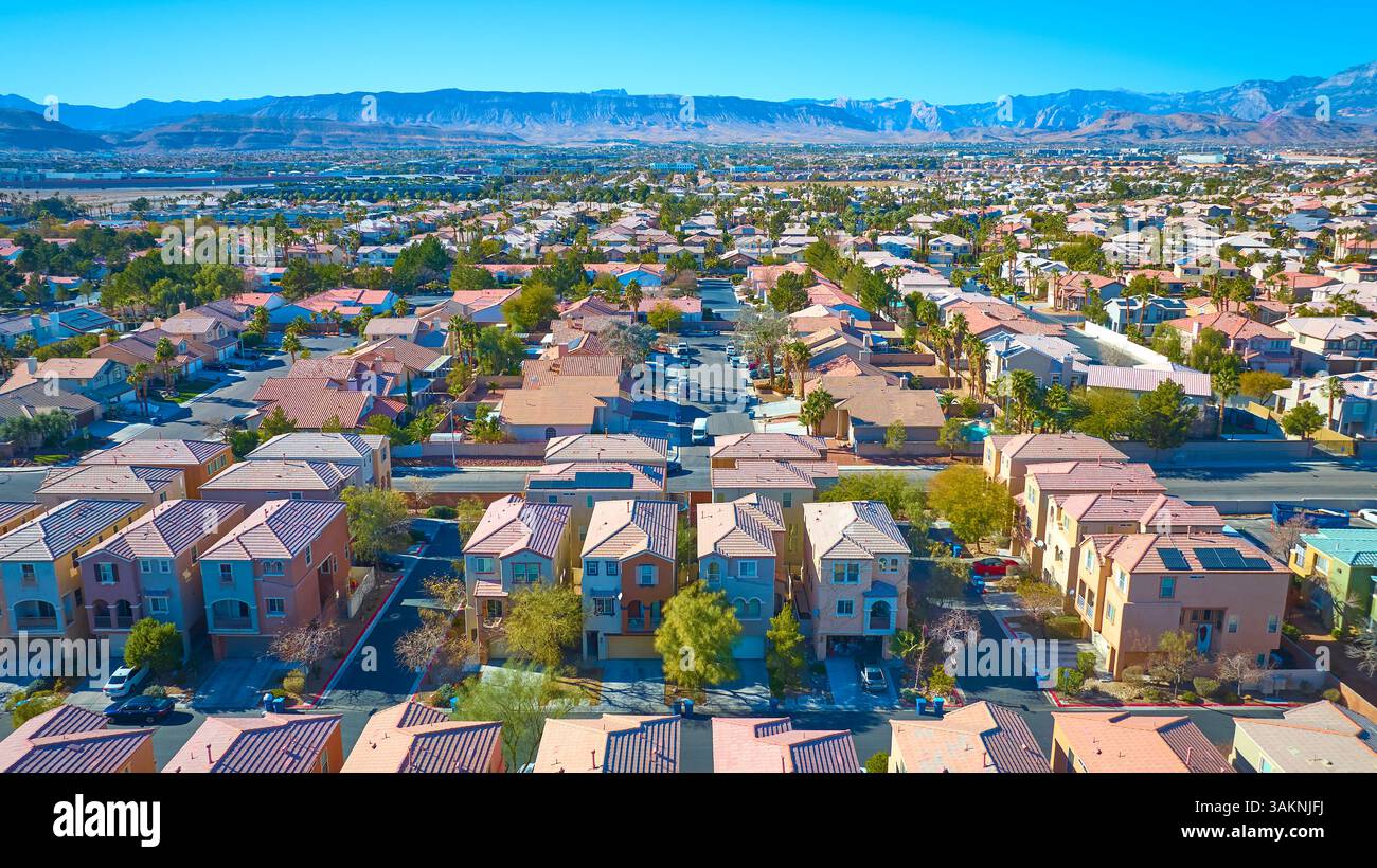 Aerial of Suburban Las Vegas Neighborhood with Palm Trees and Red Roofs Stock Photo