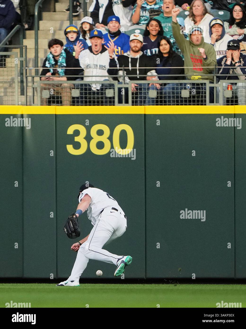 Mariners Luke Raley Seattle Mariners right fielder Luke Raley misses a fly ball single hit ...