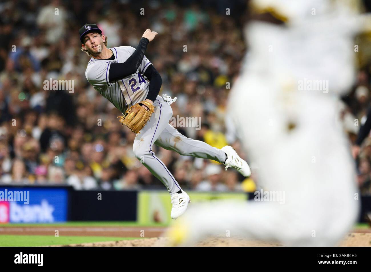 Colorado Rockies third baseman Ryan McMahon throws out San Diego Padres ...