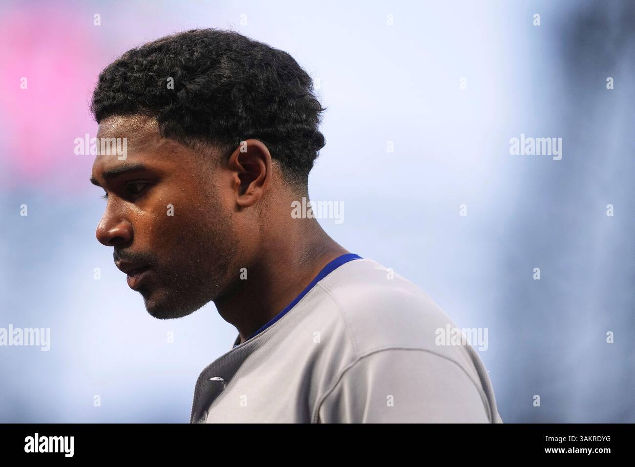 Texas Rangers starting pitcher Kumar Rocker walks back to the dugout ...