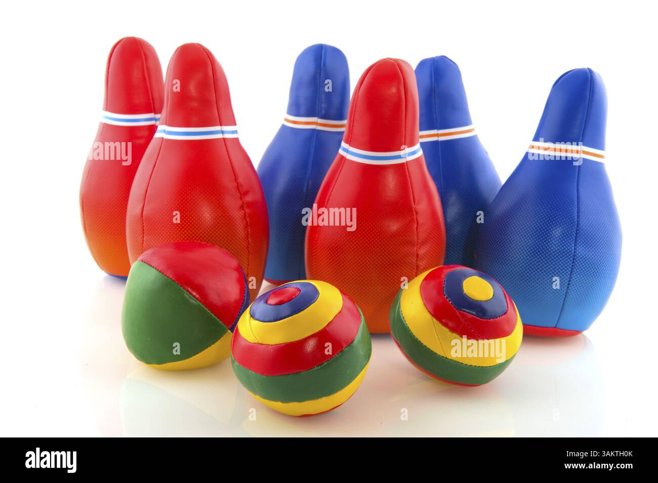 Bowling game with several pins and balls Stock Photo
