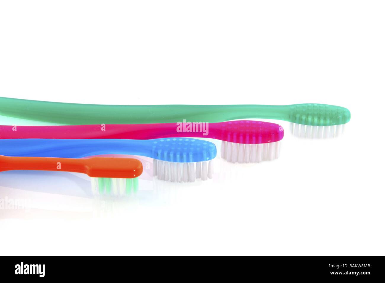 Toothbrushes from the whole family in a row Stock Photo - Alamy
