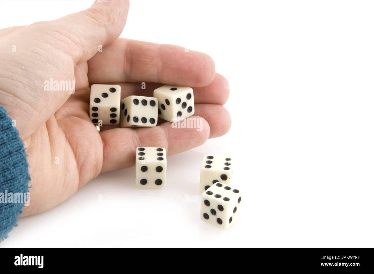Hand throwing dices with good luck Stock Photo