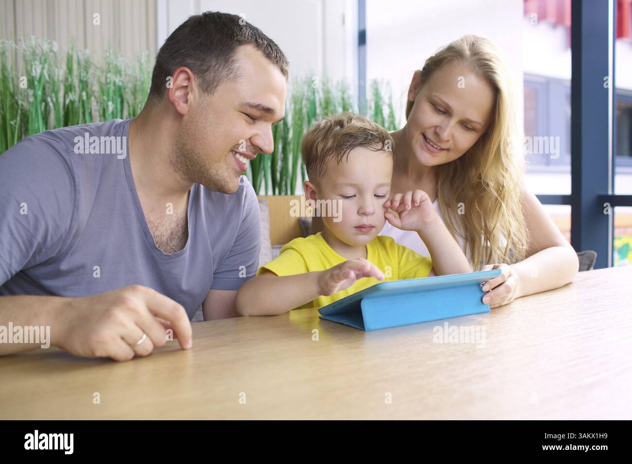 Kids ipad parents hi-res stock photography and images - Alamy