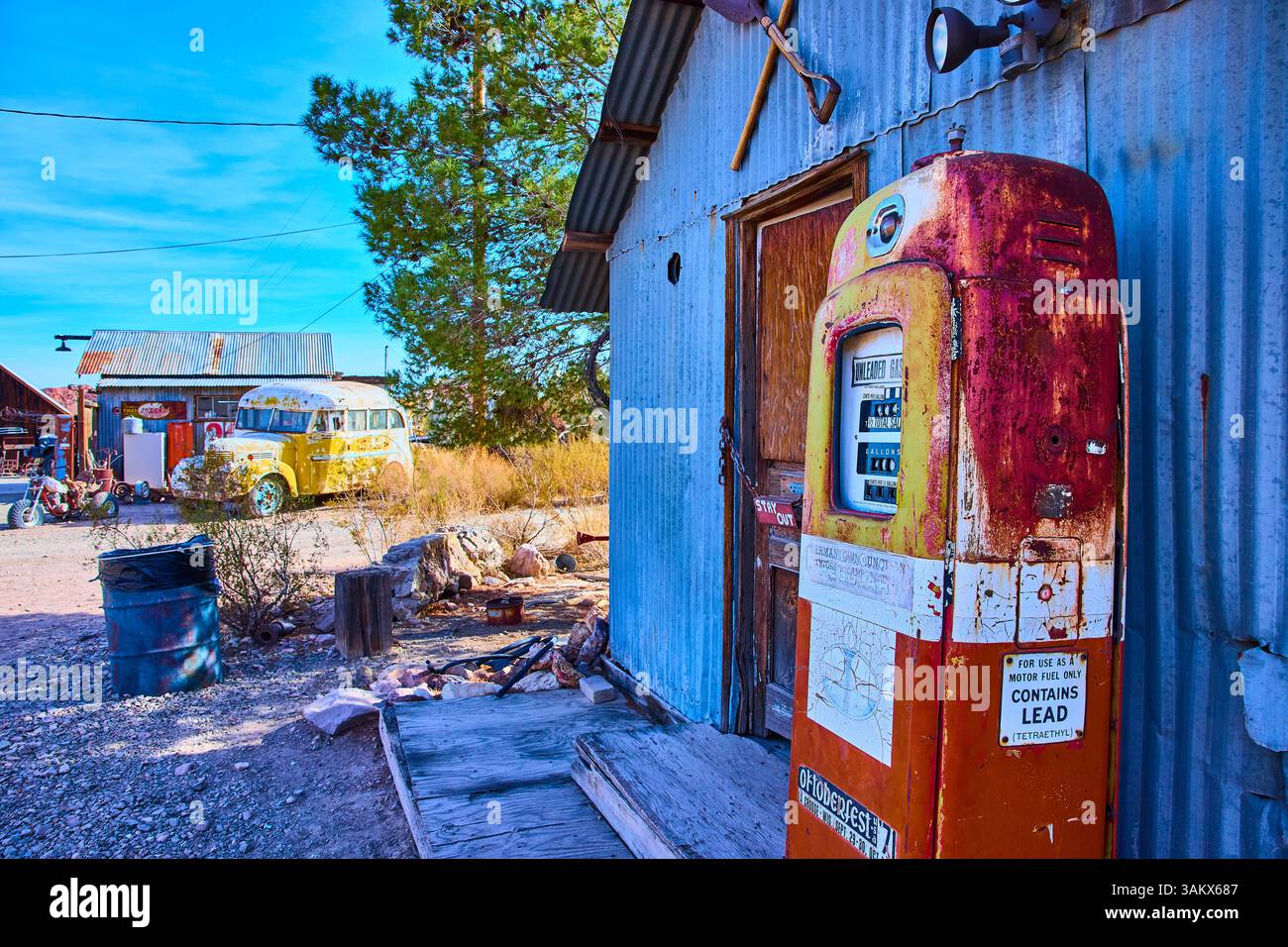 Vintage Gas Pump and Classic Bus in Nelson Nevada Eye-Level View Stock Photo