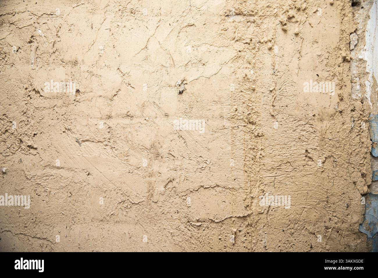 Rough Plastered Wall Texture, Beige Construction Background Stock Photo