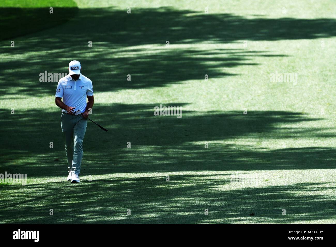 Augusta, USA. 12th Apr, 2025. Canada's Corey Conners walks up to the putting green during the round 3 of the 2025 Masters golf tournament at Augusta National Golf Club in Augusta, the United States, on April 12, 2025. Credit: Wu Xiaoling/Xinhua/Alamy Live News Stock Photo