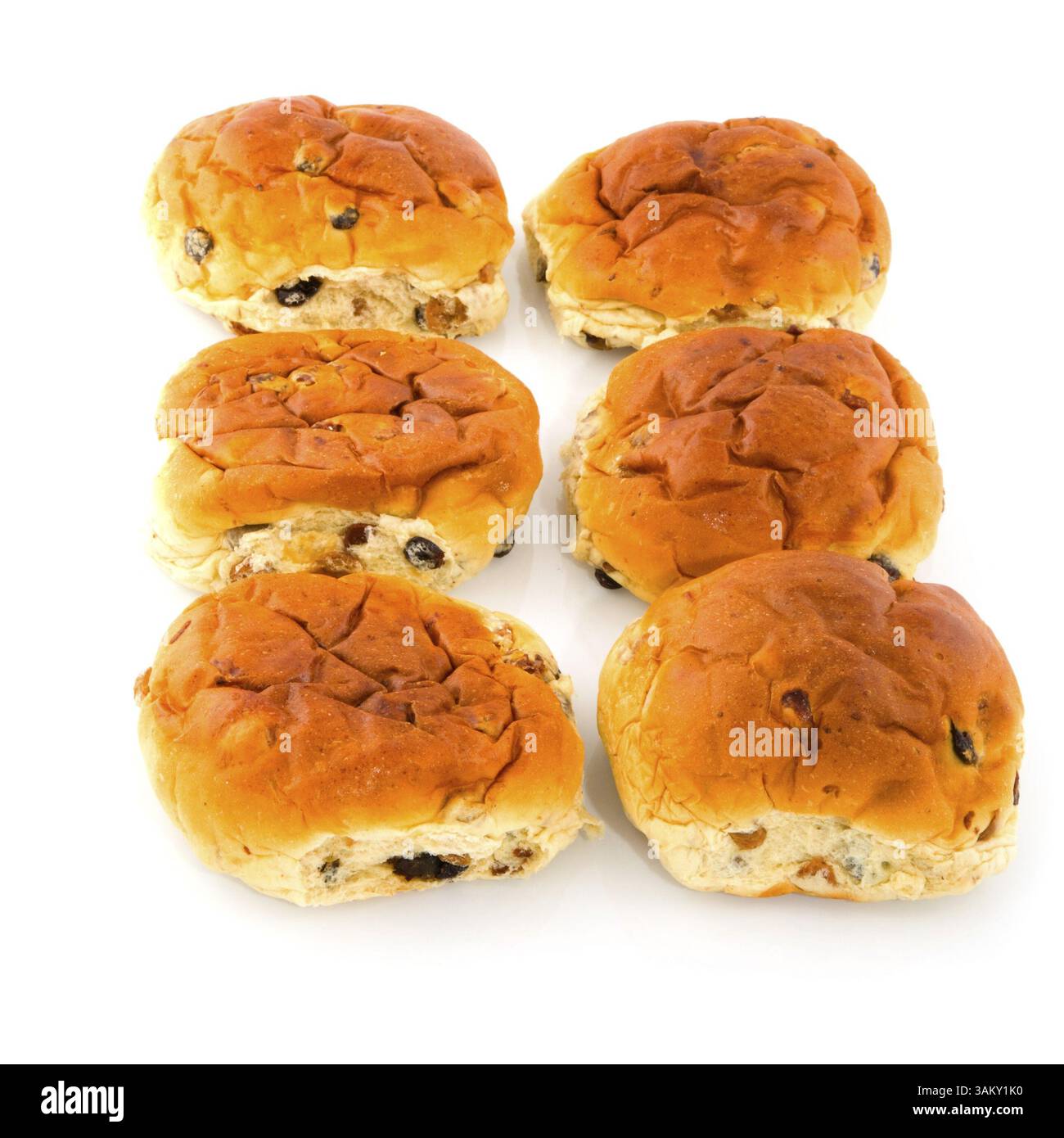 Bread rolls with currants isolated on white Stock Photo