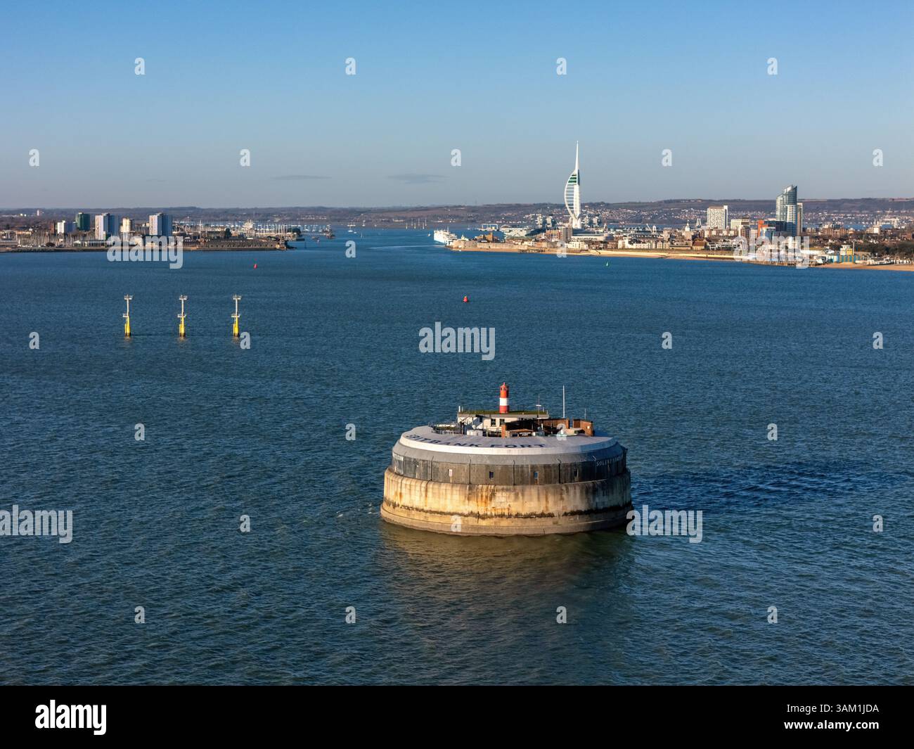 A view of the shipping channel into Portsmouth Harbour with Spitbank Fort in the foreground. Stock Photo