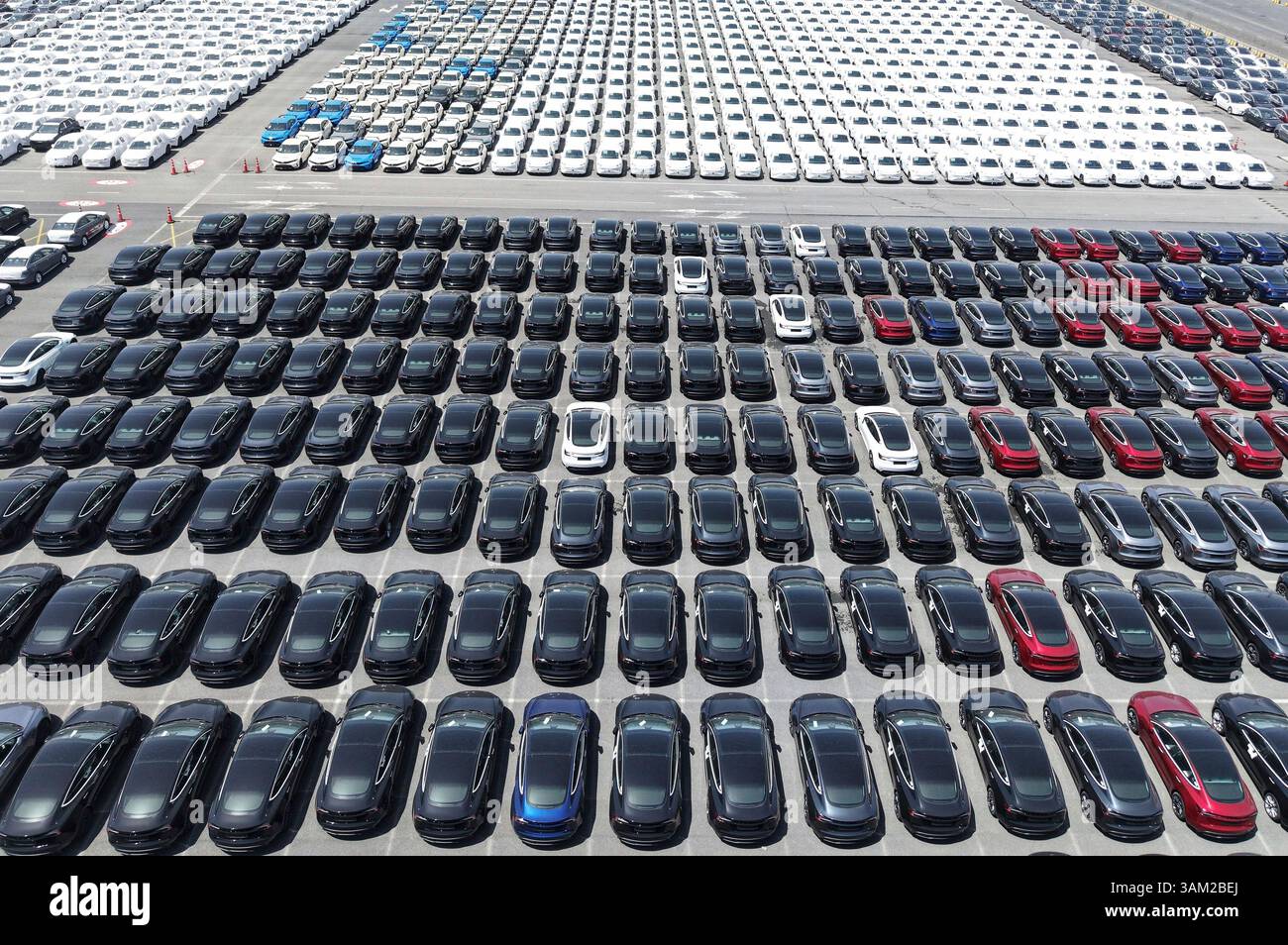 New cars wait for shipment at a ro-ro pier in Shanghai, China Sunday ...