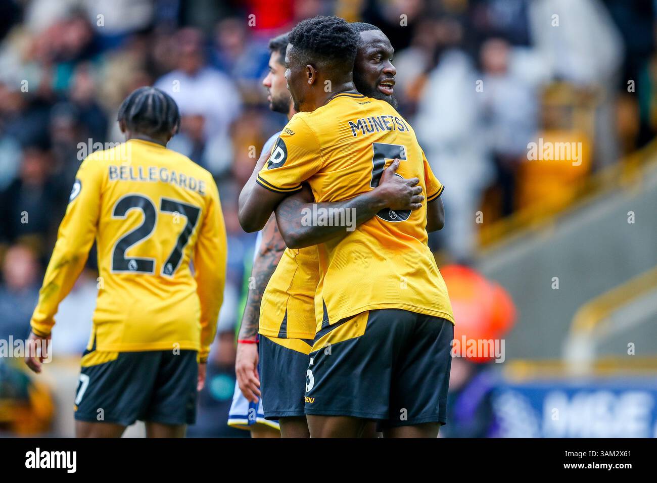 Wolverhampton Wanderers players celebrate the own goal to make it 2-0 ...
