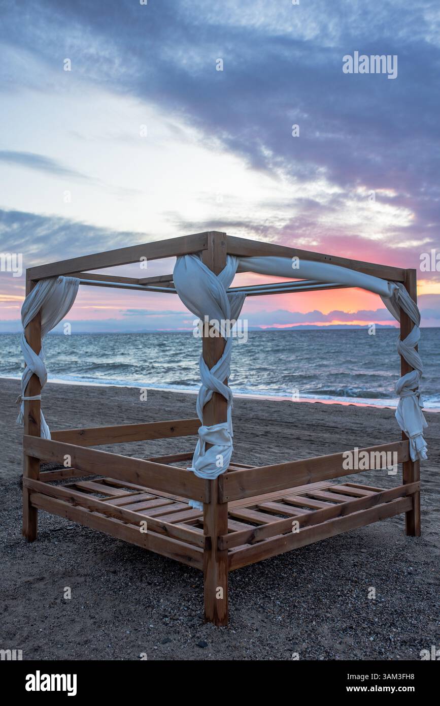 Wooden gazebo on the beach by the sea at sunset Stock Photo Alamy — free download